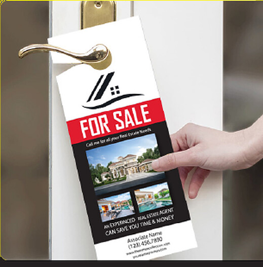 For Sale real estate door hanger being placed on a door handle
