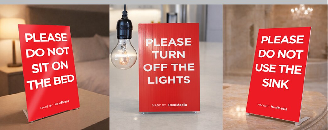 Three red generic open house signs reading Please Do Not Sit On The Bed, Please Turn Off The Lights and Please Do Not Use The Sink
